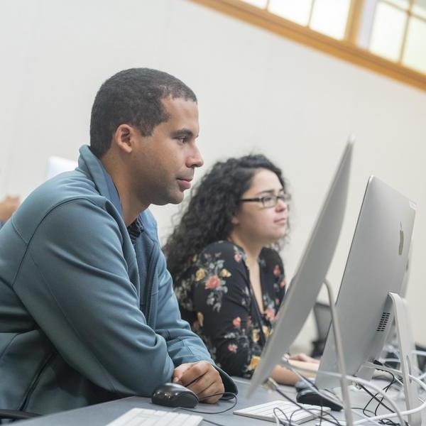 Graduate students in computer lab. 